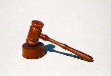 Man accused in Ryan Wedding case seeks to protect IDs of sureties, citing safety risk A judge's gavel hovering above a block