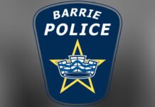 Mother charged with murder after 10-year-old child found dead in Barrie, Ont.: police logo of Barrie police