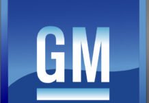 GM to cut third shift at Oshawa plant, more than 1,000 jobs impacted General Motors logo displayed on blue and purple background