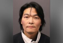 Markham man charged with criminal harassment; police seek witnesses Police-released photo of a middle-aged man with short dark hair and a neutral expression, wearing a dark jacket and light collared shirt.