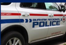 60-year-old arrested following stabbing in Oshawa home Durham regional police car