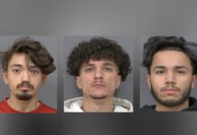 Four arrested after alleged trafficking of girls across GTA, police say Three side-by-side headshots of young men against plain backgrounds. Each is facing the camera with a neutral expression. The man on the left has medium-length hair and light facial hair, wearing a red top. The man in the centre has short curly hair and a hoodie. The man on the right has dark hair and light facial hair, wearing a dark top.