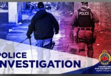Hamilton police seek suspect in East Mountain break-and-enter incidents A Hamilton Police Service graphic showing two police officers walking down a wet alleyway at night, illuminated by red and blue emergency lights. One officer wears a vest labeled “POLICE.” The words “POLICE INVESTIGATION” appear prominently, along with the Hamilton Police Service logo and the slogan