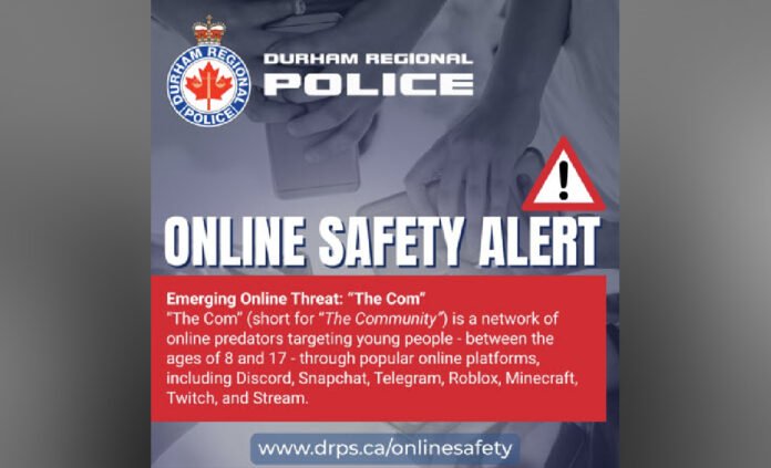 Durham Regional Police "Online Safety Alert"graphic warning about "The Com,"a network of online predators targeting youth aged 8–17 on platforms like Discord, Snapchat, Telegram, Roblox, Minecraft, Twitch, and Steam, using grooming, manipulation, intimidation, and threats such as doxing; includes a warning triangle and police logo.