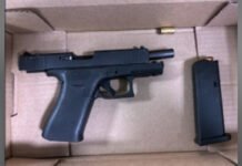 27 year-old charged after allegedly firing gun in Toronto’s west end: Police Police released image of a seized black handgun placed inside a cardboard evidence box, with a separate magazine lying beside it.