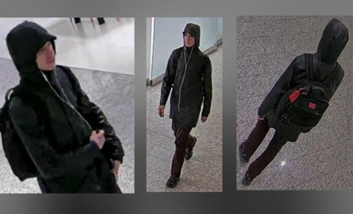 Security camera images show a man wearing a black hooded winter jacket, burgundy pants, and dark shoes, carrying a black backpack with red accents and wearing white wired earbuds, walking inside an underground concourse.