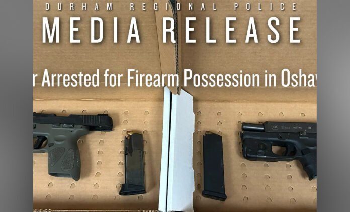 Durham Regional Police media release image showing two handguns and magazines seized in an Oshawa firearm possession case .
