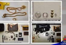 Public tip leads to arrest of Brampton man in East Mountain break-and-enter investigation A four-panel police evidence display showing items believed to be recovered property. The top-left image shows two gold-coloured chain necklaces and a ring placed on a white surface beside a yellow evidence marker. The top-right image shows several watches and circular jewellery pieces arranged next to a measurement scale. The bottom-left image displays designer-style handbags, wallets, sunglasses, keys, and multiple wristwatches laid out in rows. The bottom-right image shows additional bags, jewellery, watches, and personal accessories arranged for documentation.