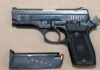 Teen charged in two ride-share carjackings in Brampton A silver Taurus semi-automatic handgun with a black grip is shown beside a detached magazine containing several rounds of ammunition, displayed as seized evidence.