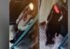 Two suspects wanted following break and enter at Queen Street East condo building Two blurry surveillance images showing a hooded individual—one in a light hoodie with a logo and another in dark clothing with a red cap, captured indoors.
